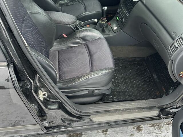 Черный Рено Лагуна, объемом двигателя 1.8 л и пробегом 260 тыс. км за 3900 $, фото 6 на Automoto.ua