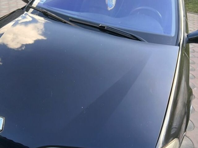 Черный Рено Лагуна, объемом двигателя 2 л и пробегом 328 тыс. км за 3207 $, фото 1 на Automoto.ua