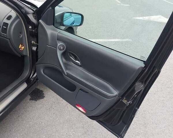 Черный Рено Лагуна, объемом двигателя 2 л и пробегом 327 тыс. км за 3500 $, фото 20 на Automoto.ua