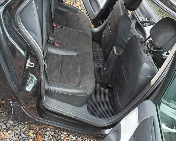 Черный Рено Лагуна, объемом двигателя 2.19 л и пробегом 420 тыс. км за 4000 $, фото 6 на Automoto.ua