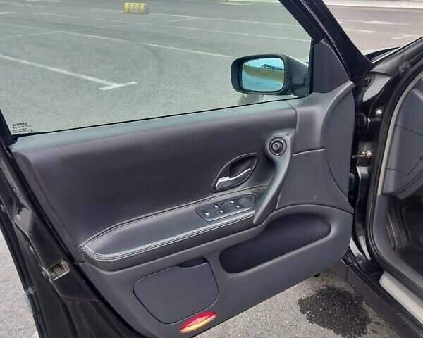 Черный Рено Лагуна, объемом двигателя 2 л и пробегом 327 тыс. км за 3500 $, фото 12 на Automoto.ua