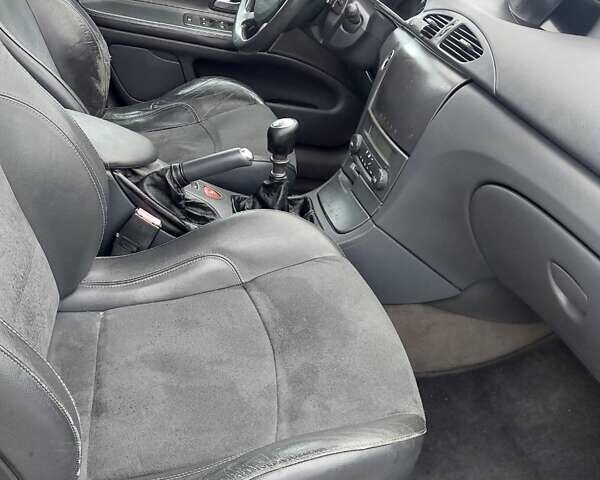 Черный Рено Лагуна, объемом двигателя 2 л и пробегом 327 тыс. км за 3500 $, фото 21 на Automoto.ua