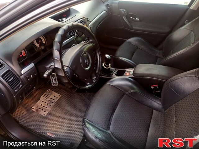 Черный Рено Лагуна, объемом двигателя 2 л и пробегом 222 тыс. км за 4400 $, фото 6 на Automoto.ua