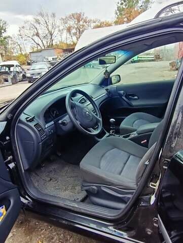 Рено Лагуна 2006 в Луцке на Automoto.ua Черный Рено Лагуна, объемом двигателя 1.9 л и пробегом 267 тыс. км за 4600 $, фото 8 на Automoto.ua