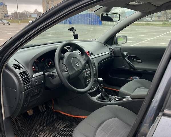 Черный Рено Лагуна, объемом двигателя 1.9 л и пробегом 293 тыс. км за 4500 $, фото 7 на Automoto.ua