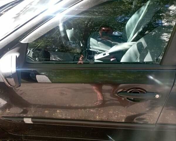 Черный Рено Лагуна, объемом двигателя 1.59 л и пробегом 275 тыс. км за 3500 $, фото 20 на Automoto.ua