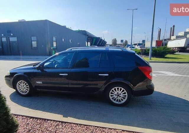 Черный Рено Лагуна, объемом двигателя 2 л и пробегом 284 тыс. км за 4500 $, фото 12 на Automoto.ua