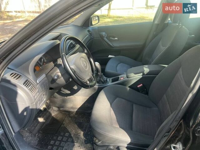 Черный Рено Лагуна, объемом двигателя 2 л и пробегом 146 тыс. км за 4400 $, фото 12 на Automoto.ua