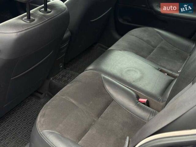 Черный Рено Лагуна, объемом двигателя 2 л и пробегом 168 тыс. км за 5799 $, фото 10 на Automoto.ua