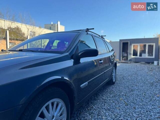 Черный Рено Лагуна, объемом двигателя 1.9 л и пробегом 220 тыс. км за 3700 $, фото 1 на Automoto.ua