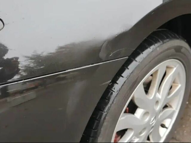 Черный Рено Лагуна, объемом двигателя 2 л и пробегом 170 тыс. км за 3500 $, фото 2 на Automoto.ua