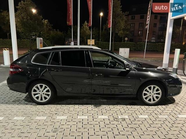 Черный Рено Лагуна, объемом двигателя 2 л и пробегом 205 тыс. км за 6963 $, фото 9 на Automoto.ua