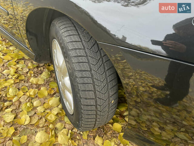 Черный Рено Лагуна, объемом двигателя 1.5 л и пробегом 302 тыс. км за 5950 $, фото 6 на Automoto.ua