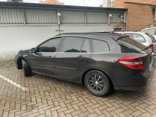 Черный Рено Лагуна, объемом двигателя 1.5 л и пробегом 210 тыс. км за 6750 $, фото 1 на Automoto.ua