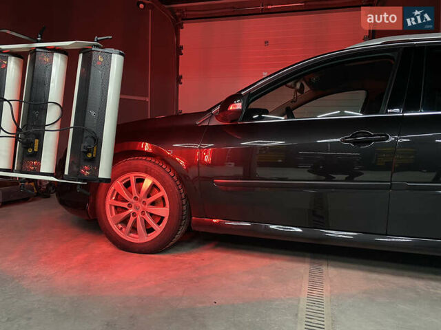 Черный Рено Лагуна, объемом двигателя 2 л и пробегом 290 тыс. км за 8500 $, фото 18 на Automoto.ua