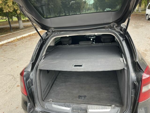 Черный Рено Лагуна, объемом двигателя 1.5 л и пробегом 210 тыс. км за 6750 $, фото 10 на Automoto.ua