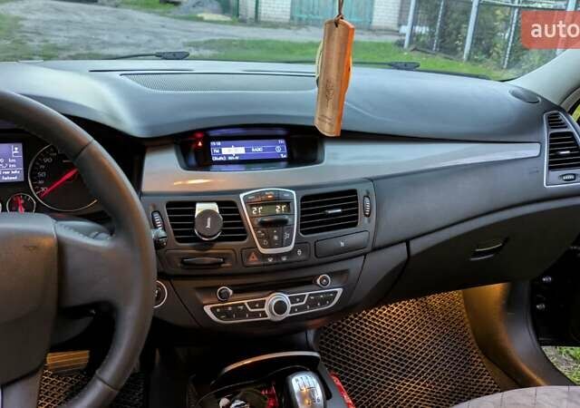 Рено Лагуна 2011 в Остоге на Automoto.ua Черный Рено Лагуна, объемом двигателя 1.5 л и пробегом 222 тыс. км за 6500 $, фото 1 на Automoto.ua