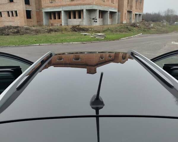 Черный Рено Лагуна, объемом двигателя 1.5 л и пробегом 149 тыс. км за 8300 $, фото 10 на Automoto.ua