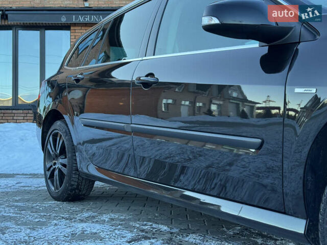 Чорний Рено Лагуна, об'ємом двигуна 2 л та пробігом 187 тис. км за 10799 $, фото 5 на Automoto.ua