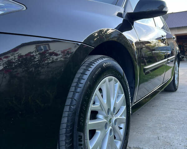 Черный Рено Лагуна, объемом двигателя 2 л и пробегом 224 тыс. км за 9250 $, фото 10 на Automoto.ua