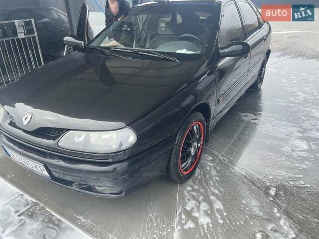 Чорний Рено Лагуна, об'ємом двигуна 2 л та пробігом 309 тис. км за 2100 $, фото 1 на Automoto.ua