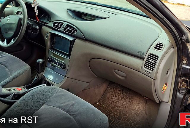 Черный Рено Лагуна, объемом двигателя 2 л и пробегом 352 тыс. км за 3100 $, фото 1 на Automoto.ua