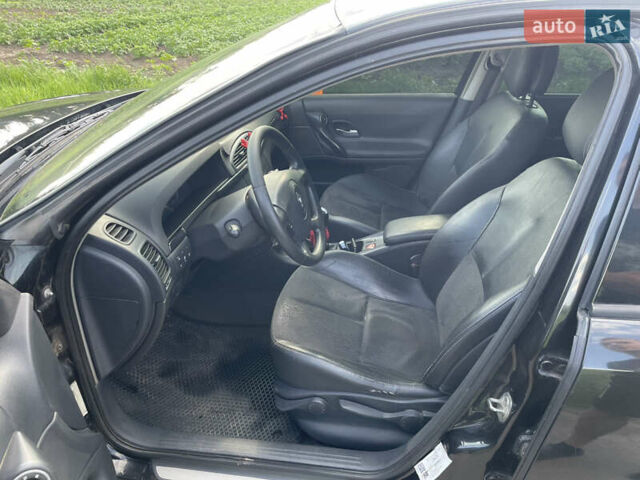 Рено Лагуна 2006 в Лебедине на Automoto.ua Черный Рено Лагуна, объемом двигателя 2 л и пробегом 245 тыс. км за 4699 $, фото 7 на Automoto.ua
