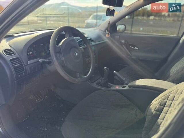 Черный Рено Лагуна, объемом двигателя 1.6 л и пробегом 146 тыс. км за 3850 $, фото 2 на Automoto.ua