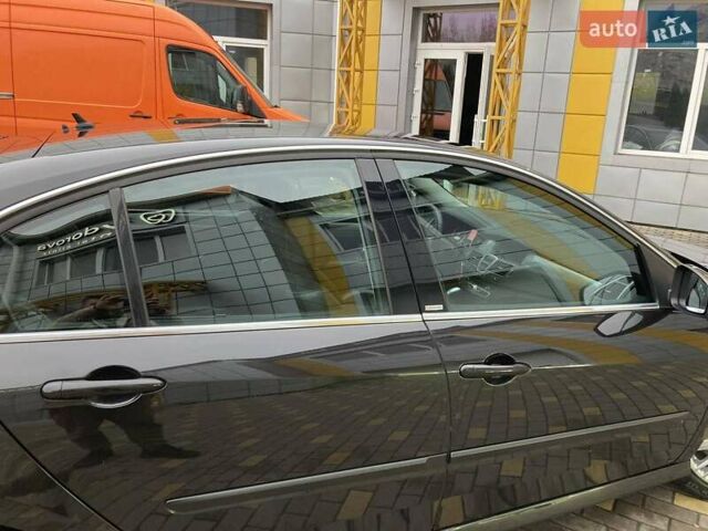 Черный Рено Лагуна, объемом двигателя 2 л и пробегом 190 тыс. км за 12500 $, фото 37 на Automoto.ua