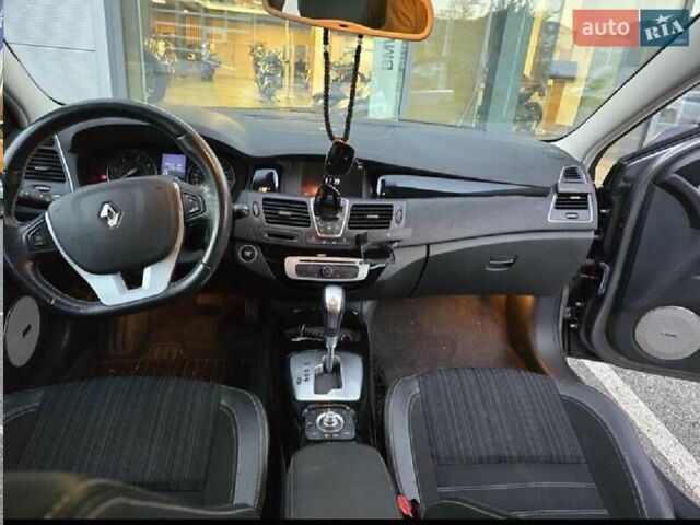 Коричневый Рено Лагуна, объемом двигателя 2 л и пробегом 210 тыс. км за 9499 $, фото 2 на Automoto.ua