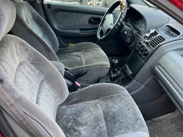 Красный Рено Лагуна, объемом двигателя 2 л и пробегом 300 тыс. км за 1307 $, фото 5 на Automoto.ua