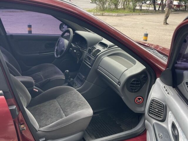 Червоний Рено Лагуна, об'ємом двигуна 1.8 л та пробігом 310 тис. км за 2450 $, фото 14 на Automoto.ua
