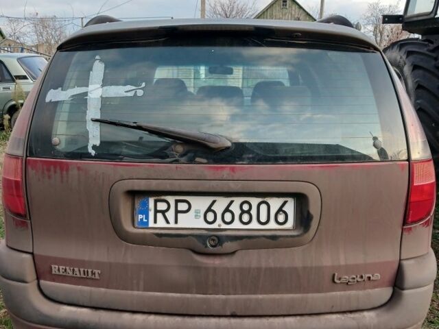 Красный Рено Лагуна, объемом двигателя 2 л и пробегом 300 тыс. км за 1307 $, фото 1 на Automoto.ua