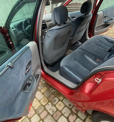 Красный Рено Лагуна, объемом двигателя 1.87 л и пробегом 112 тыс. км за 3999 $, фото 11 на Automoto.ua