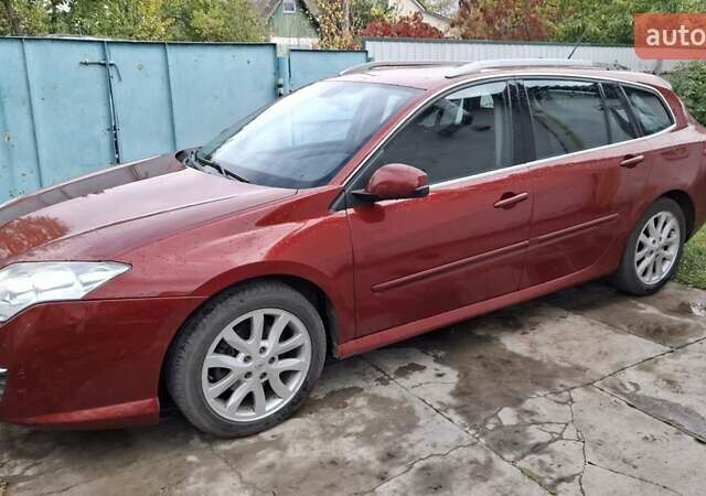 Красный Рено Лагуна, объемом двигателя 2 л и пробегом 225 тыс. км за 6500 $, фото 9 на Automoto.ua