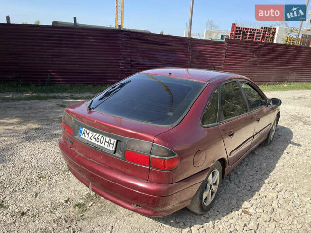 Красный Рено Лагуна, объемом двигателя 2 л и пробегом 300 тыс. км за 1950 $, фото 16 на Automoto.ua