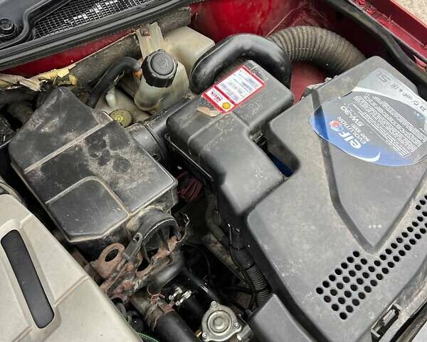 Красный Рено Лагуна, объемом двигателя 1.78 л и пробегом 230 тыс. км за 4300 $, фото 31 на Automoto.ua