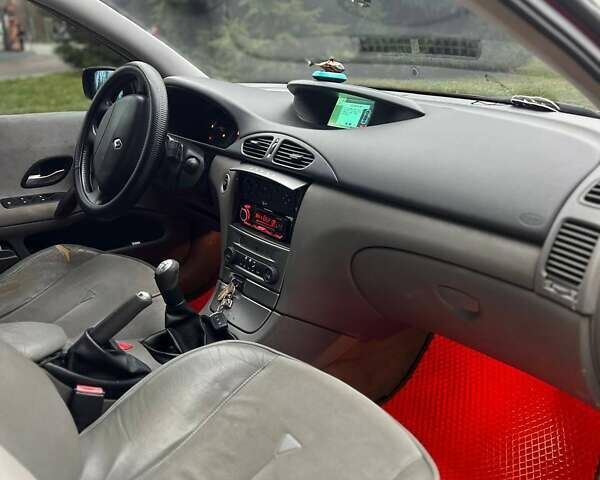 Красный Рено Лагуна, объемом двигателя 1.78 л и пробегом 230 тыс. км за 4300 $, фото 13 на Automoto.ua