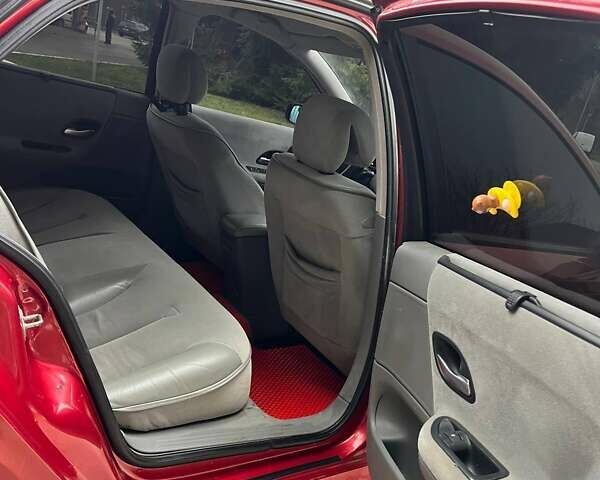 Красный Рено Лагуна, объемом двигателя 1.78 л и пробегом 230 тыс. км за 4300 $, фото 18 на Automoto.ua