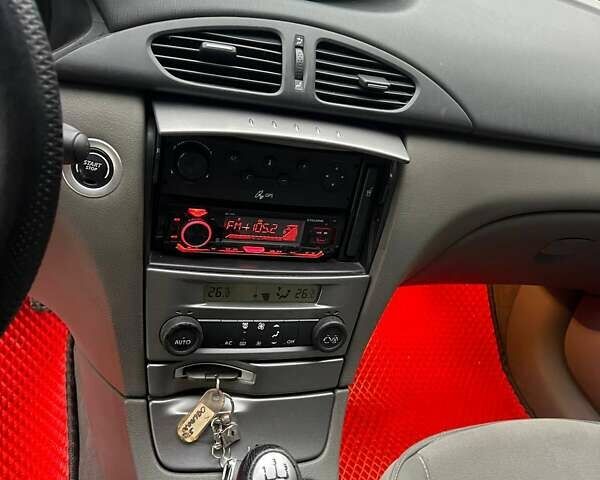 Красный Рено Лагуна, объемом двигателя 1.78 л и пробегом 230 тыс. км за 4300 $, фото 27 на Automoto.ua