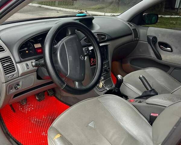 Красный Рено Лагуна, объемом двигателя 1.78 л и пробегом 230 тыс. км за 4300 $, фото 23 на Automoto.ua