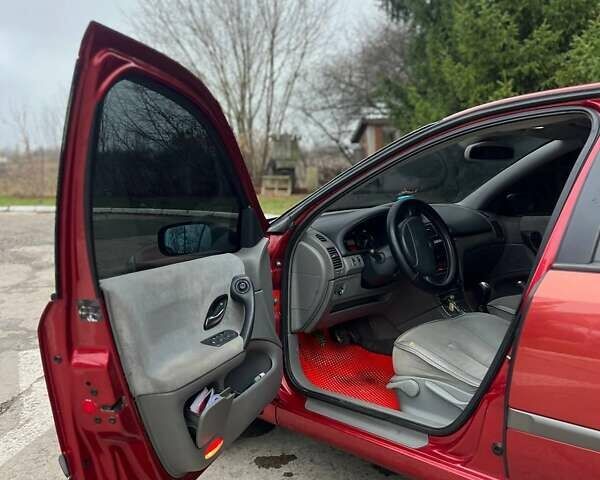 Красный Рено Лагуна, объемом двигателя 1.78 л и пробегом 230 тыс. км за 4300 $, фото 22 на Automoto.ua