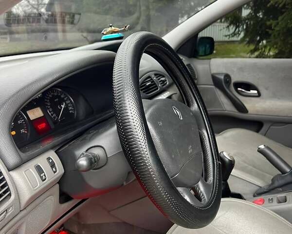 Красный Рено Лагуна, объемом двигателя 1.78 л и пробегом 230 тыс. км за 4300 $, фото 26 на Automoto.ua