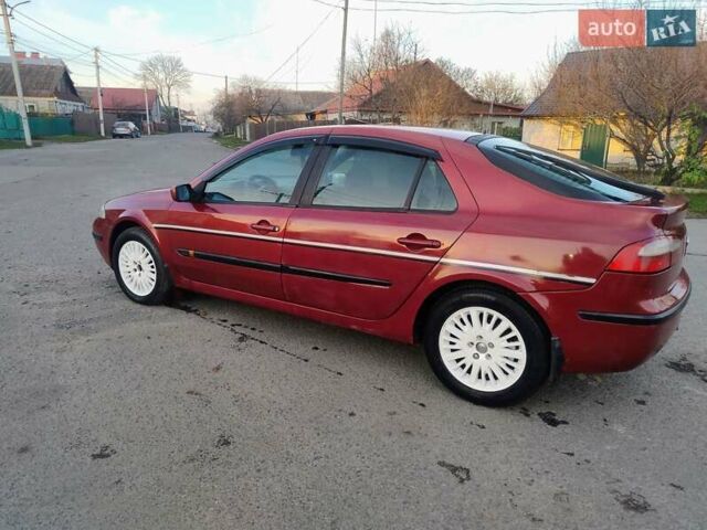 Красный Рено Лагуна, объемом двигателя 1.9 л и пробегом 321 тыс. км за 3000 $, фото 2 на Automoto.ua