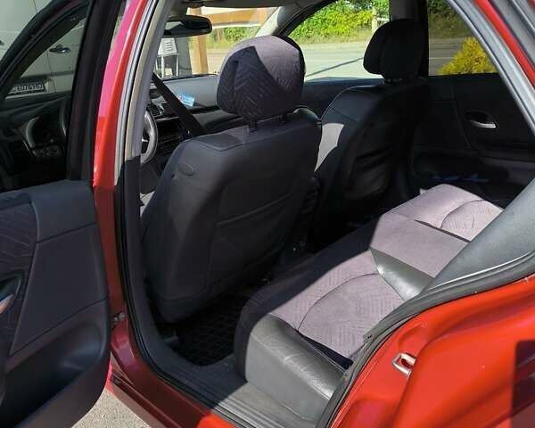 Рено Лагуна 2002 в Дрогобыче на Automoto.ua Красный Рено Лагуна, объемом двигателя 1.8 л и пробегом 275 тыс. км за 3399 $, фото 9 на Automoto.ua