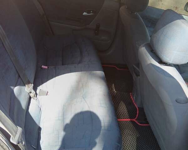 Красный Рено Лагуна, объемом двигателя 1.9 л и пробегом 350 тыс. км за 3600 $, фото 3 на Automoto.ua