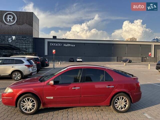 Червоний Рено Лагуна, об'ємом двигуна 2 л та пробігом 144 тис. км за 5700 $, фото 5 на Automoto.ua