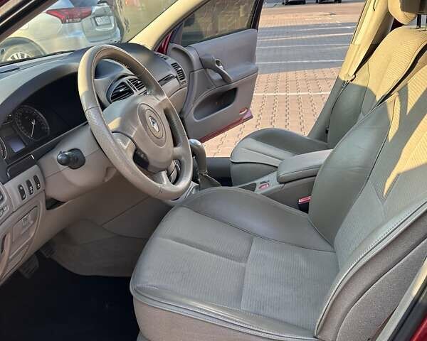 Червоний Рено Лагуна, об'ємом двигуна 2 л та пробігом 144 тис. км за 5700 $, фото 10 на Automoto.ua