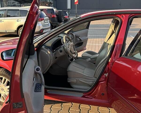 Червоний Рено Лагуна, об'ємом двигуна 2 л та пробігом 144 тис. км за 5700 $, фото 11 на Automoto.ua