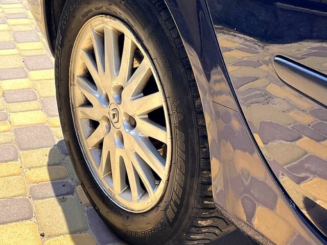 Рено Лагуна, объемом двигателя 2 л и пробегом 222 тыс. км за 2699 $, фото 5 на Automoto.ua